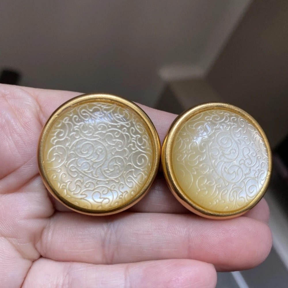 Vintage MoonGlow elegant clip on Earrings. Gold tone and cream. Scroll design.